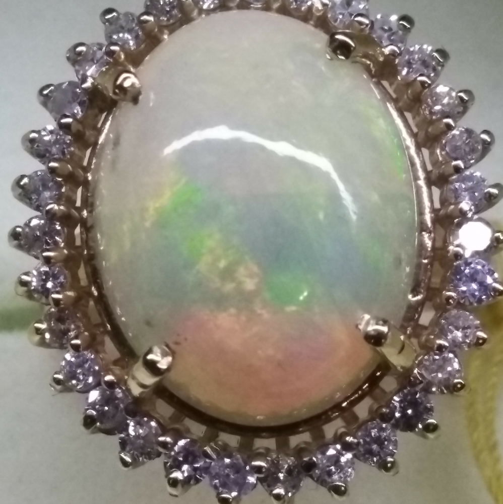 Opal and diamond ring